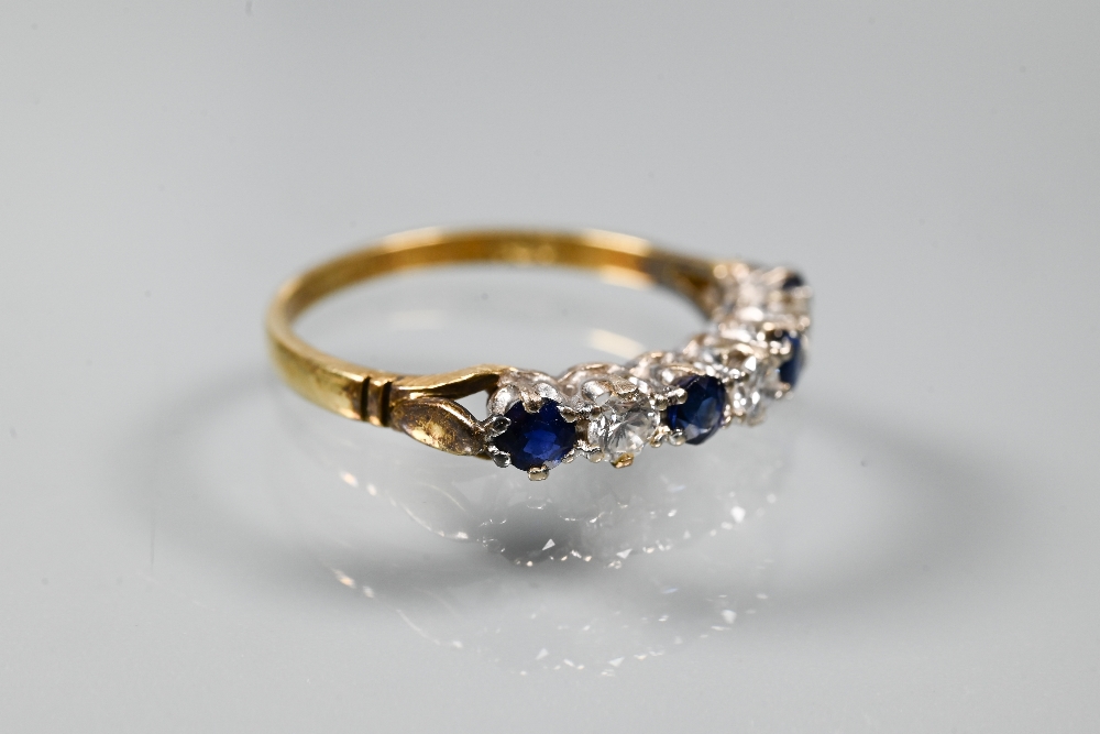 An 18ct yellow gold ring set with three oval blue sapphires with two diamonds between, size P to/w a - Image 3 of 6