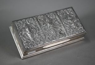 A Siamese Sterling cigarette box, the hinged cover embossed and chased with deities, 21cm wide