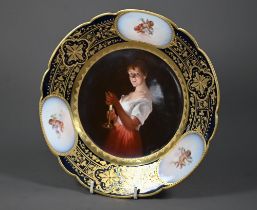 A Vienna porcelain cabinet plate, painted with 'Girl with a Candle' after Georges de la Tour, signed