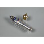 A 9ct divers helmet charm to/w a propelling pencil in the form of a sarcophagus, white metal with