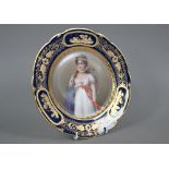 A 19th century Vienna porcelain wall-plate painted with portraits of a lady, 'Luise', within a