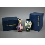 A boxed Moorcroft 'Combermere' vase, 13.5 cm to/w another boxed Moorcroft floral-design vase, 13.5