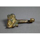 A Chinese gilt bronze belt hook in the Han dynasty manner cast with a kneeling figure and