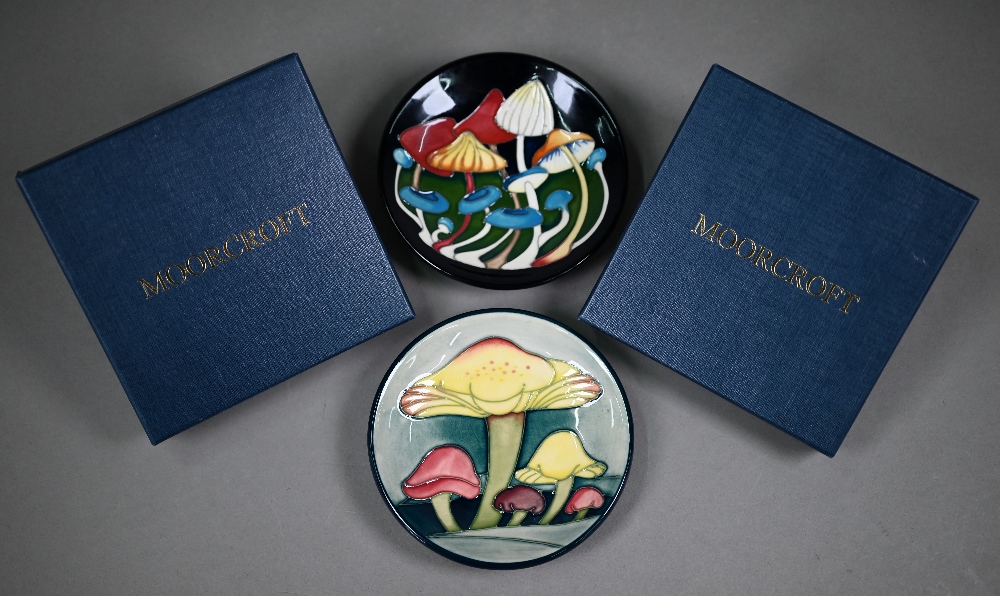 Two boxed Moorcroft 12 cm dishes, 'Pixie Parasols' 2015 and 'Claremont Revival' 2013 (2)