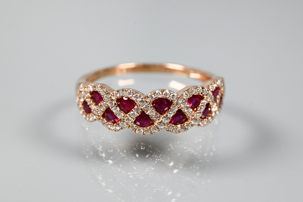 A ring and earring suite stamped 'Royal', with ruby and diamond lattice-work design, rose metal - Image 2 of 6