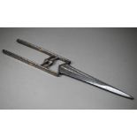 An antique Indian steel katar punch-dagger, the 23 cm blade with tapering fullers, the floral