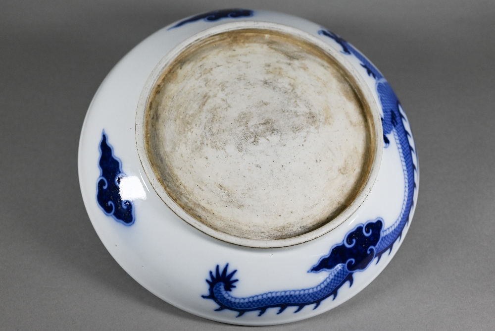 A Chinese transitional style blue and white dragon charger in the mid 17th century manner, painted - Image 4 of 8