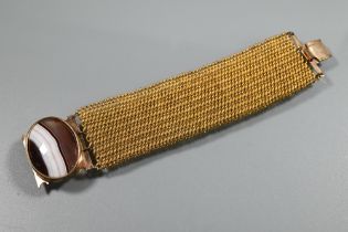 A Regency bright pinchbeck mesh link bracelet, with good size oval agate clasp