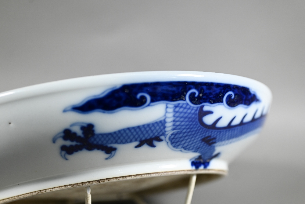 A Chinese transitional style blue and white dragon charger in the mid 17th century manner, painted - Image 7 of 8