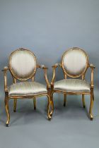 A pair of contemporary French style gilt framed salon chairs (2)