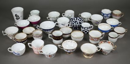 A collection of thirty-two Georgian-Elizabeth II Derby and Crown Derby cups