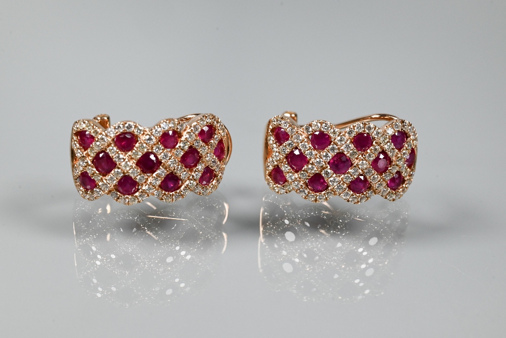 A ring and earring suite stamped 'Royal', with ruby and diamond lattice-work design, rose metal - Image 5 of 6