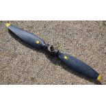 A Vintage Avro Anson aircraft twin blade propeller, black finish with yellow tips, marked 'DA 902'