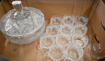 A cut glass punch-bowl and cover to/w eleven matching cups and a ladle