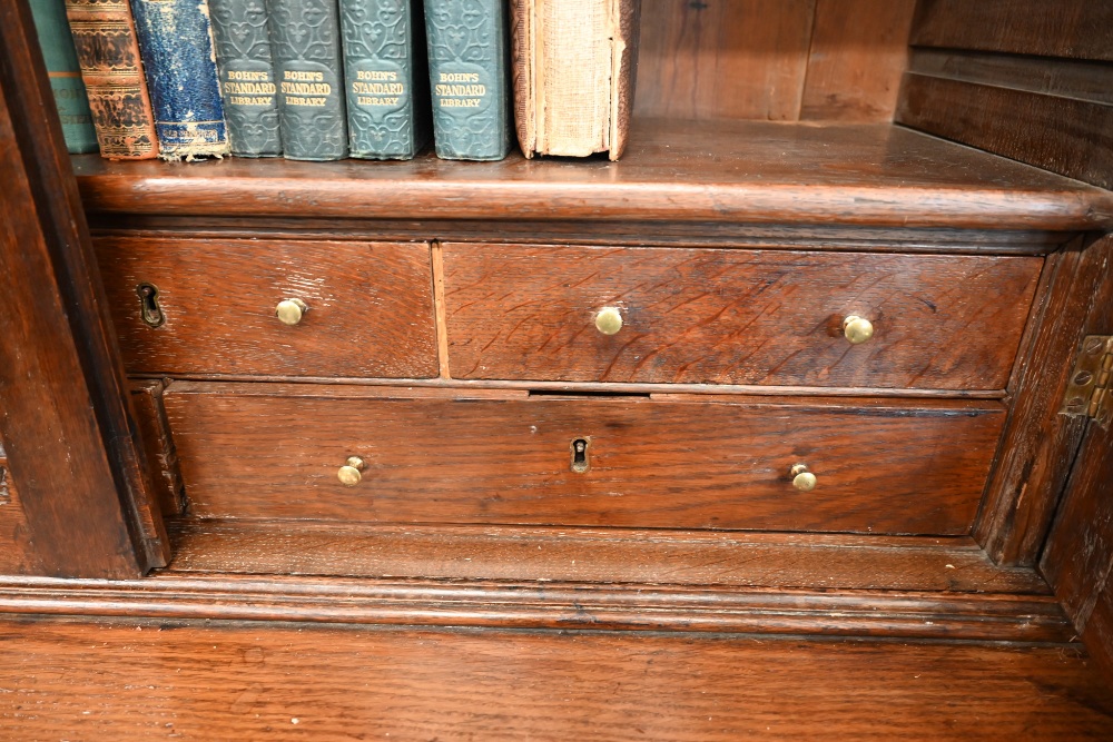 An antique oak cabinet bookcase, the lattice wire panelled doors enclosing shelves and small drawers - Image 3 of 8