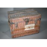 Crouch & Fitzgerald, New York, two late 19th/20th century dome top travel trunks, with stiped canvas
