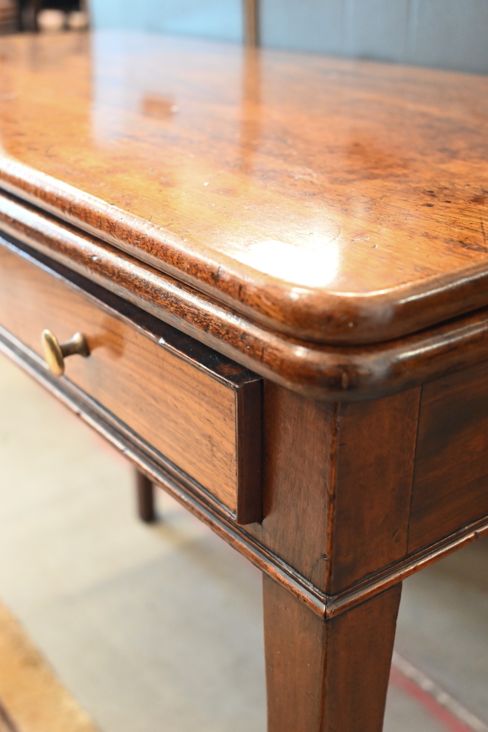 A 19th century mahogany folding tea table with single frieze drawer, tapering square supports, 92 cm - Image 2 of 6