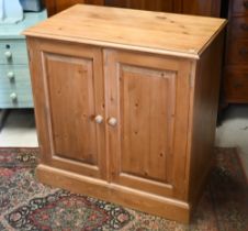 A modern pine two door cupboard, 90 cm w x 56 cm x 90 cm