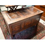 An 18th century joint oak coffer, 104 cm x 48 cm x 55 cm h (top loose)