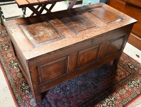 An 18th century joint oak coffer, 104 cm x 48 cm x 55 cm h (top loose)