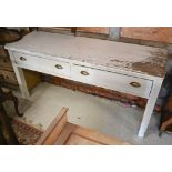 A Victorian white painted (distressed/worn/peeling) pine two drawer wall-mounted side table /