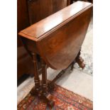 A Victorian mahogany Sutherland table with turned gate-leg action supports