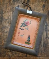 An antique rectangular terracotta tile or wall plaque, hand painted with floral sprays, mayflies and