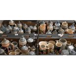 A large collection of over seventy 19th century and later German bier-steins, jugs, mugs etc (4