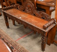 A carved oak Gothic Revival hall bench, 125 cm wide