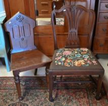 A Victorian oak hall chair to/with a Georgian mahogany dining side chair, with tapestry seat (2)