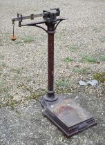 A vintage iron pillar medical scale stencilled for John Bell, Croydon