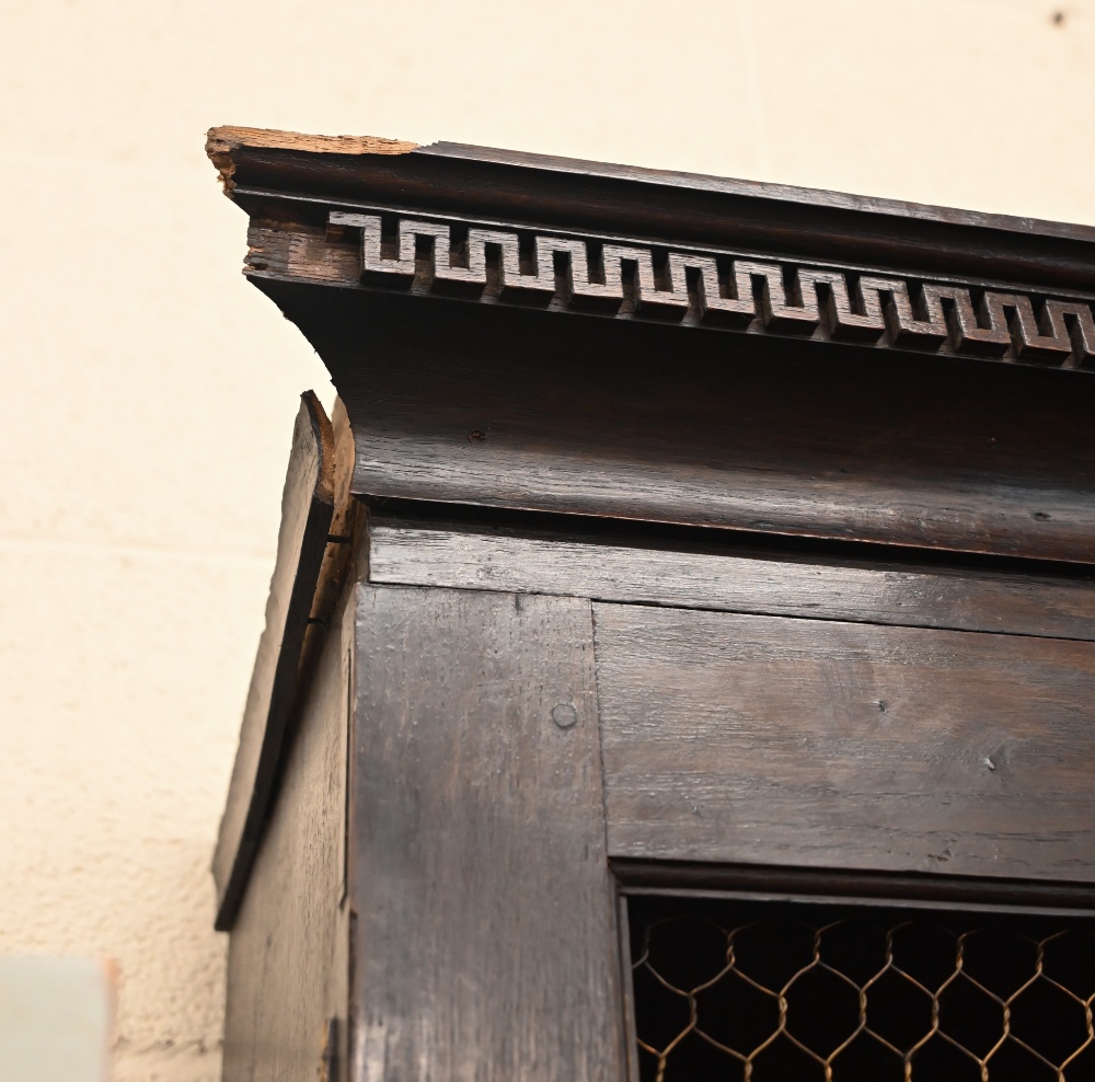 An antique oak cabinet bookcase, the lattice wire panelled doors enclosing shelves and small drawers - Image 6 of 8