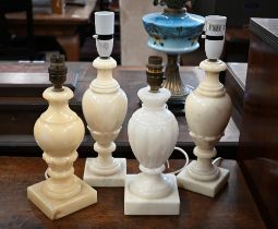 Four alabaster table lamps