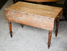 A Victorian pine drop-leaf scullery table, with drawer to one end, on turned legs, 108 cm x 60 cm