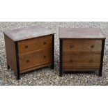 A pair of mid century small oak and ebonised two drawer chests, 62 cm wide x 44 cm deep x 60 cm high