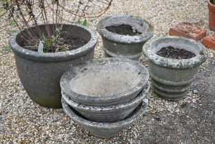 A trio of weathered cast stone planters to/with another pair and a large single planter (6)