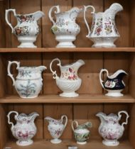 A Regency New Hall helmet-shaped cream jug decorated in the famille-rose manner, no.218, 12.5 cm