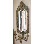A 19th century brass Italianate three-sconce girandole mirror with pierced and embossed frame and