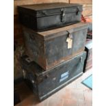 Two vintage black tin trunks to/with a steel bound trunk and a black tin box (4)