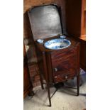 A George III century mahogany wash stand with hinged top enclosing Copeland Spode's Italian blue and