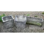 A pair of weathered cast stone planters to/with a similar trough planter (3)