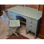 A blue grain painted six drawer dressing table, 122 cm x 61 cm x 73 cm h