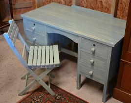 A blue grain painted six drawer dressing table, 122 cm x 61 cm x 73 cm h