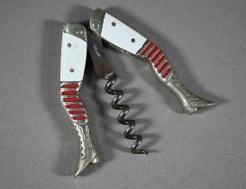 A replica novelty 'legs' corkscrew with white enamel thighs and red-striped stockings, 6.5 cm