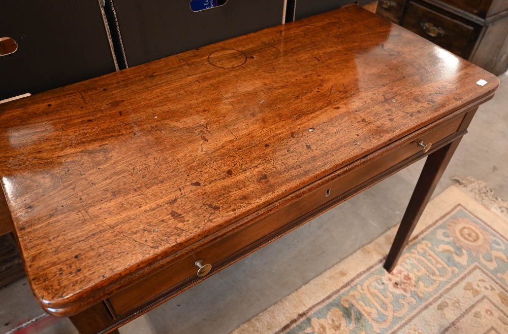 A 19th century mahogany folding tea table with single frieze drawer, tapering square supports, 92 cm - Image 6 of 6