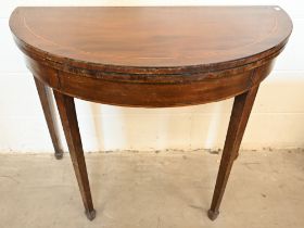 A 19th century mahogany inlaid demi lune tea table with folding top on tapering square legs, 92 cm