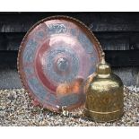 A large Indian brass and silvered tray with engraved decoration, 76 cm diam to/w a pierced brass