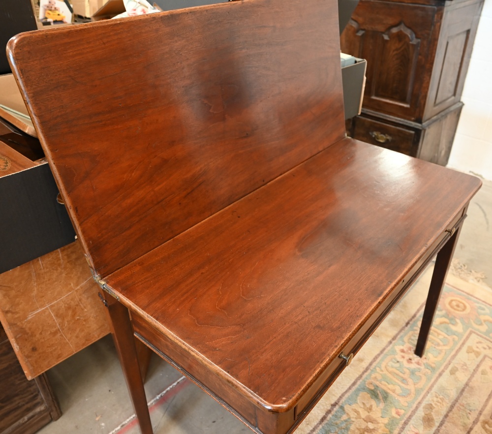 A 19th century mahogany folding tea table with single frieze drawer, tapering square supports, 92 cm - Image 5 of 6