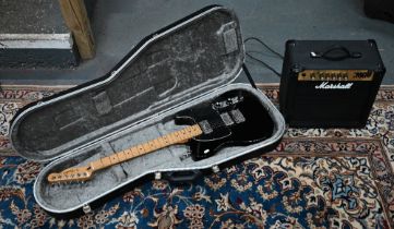 A Fender black-top Telecaster electric guitar to/w hard case and a Marshall MG 15 practice amp (2)