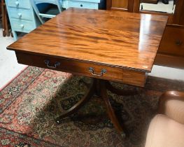 A Victorian and later square top double sided library table, with drawer to two sides, raised on a